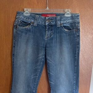 Guess Women's boot cut low rise Jeans in Faded Blue Denim